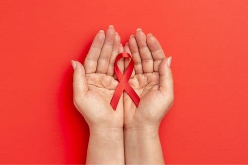How long does HIV live outside the body?